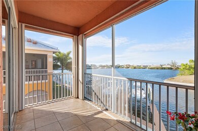 Unfurnished sunroom featuring a water view and a w