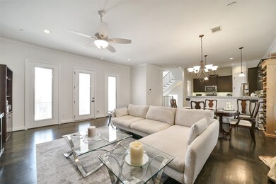 Open kitchen and living area make for great entertaining options, open the patio door for fresh air and more space for guests!