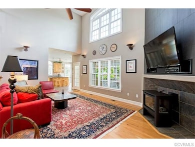 Great Room with upper & lower triple rear-facing w