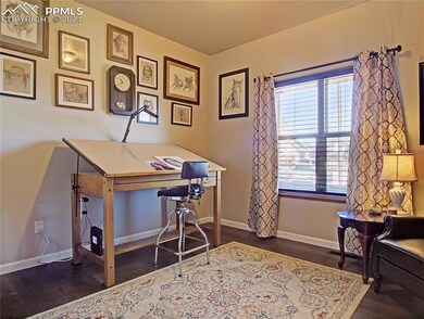 Main level bedroom complete with closet could be a