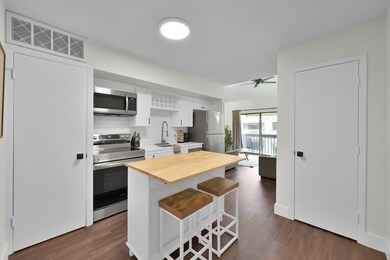 The kitchen is open to your living and entertainme
