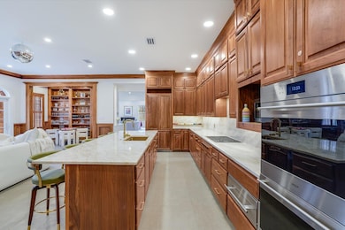 Kitchen featuring a breakfast bar area, visible v