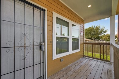 Covered front porch offers a welcoming entry and space to relax.