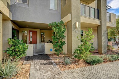 View of exterior entry featuring stucco siding
