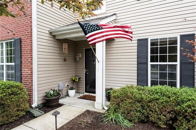 Covered entry greets guests. 
