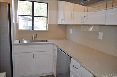 Brand new kitchen features beautiful quartz counte