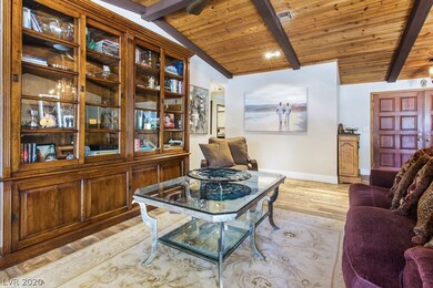 Formal Living Room with gas fireplace, vaulted woo