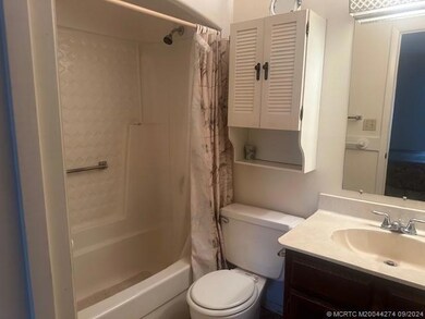 THIS IS THE BATHROOM OFF THE PRIMARY BEDROOM AREA.