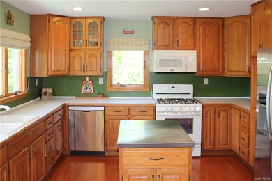 Spacious kitchen with lots of cabinet and counter 