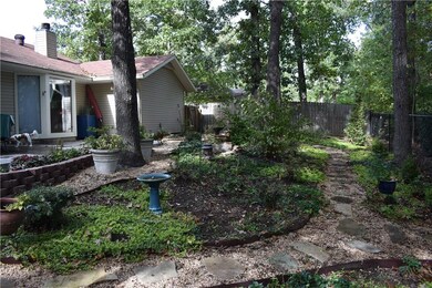 Retaining wall sculpts patio.