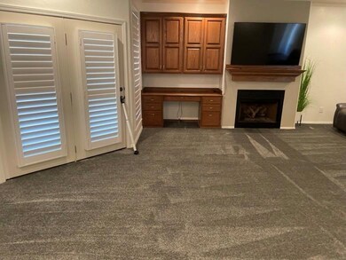 Unfurnished living room featuring  Grey colored ca