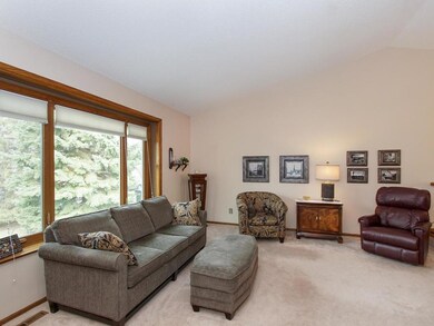Living room with newer front window. The homeowner
