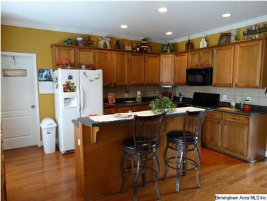 Kitchen has breakfast bar