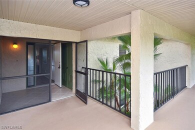Front entrance to unit with storage area behind th