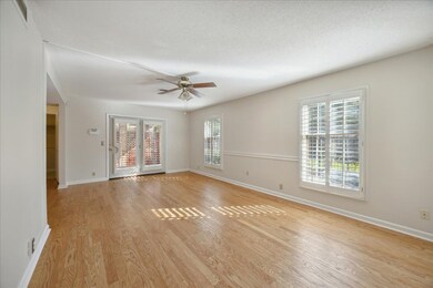 The cheerful living room is flooded with natural l