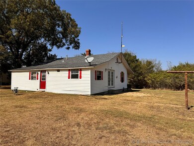 front and side of house with patio
