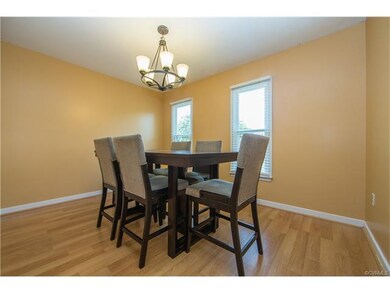 Dining Room with laminate floor, ceiling fan and d