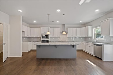 Kitchen featuring stainless steel appliances, a ki