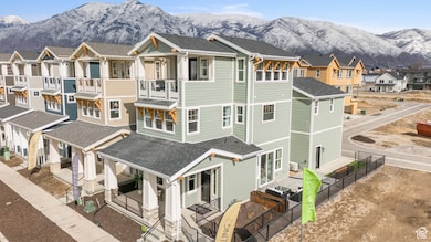 Aerial view of residential area featuring a mountain backdrop