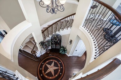 Upstairs view over the foyer such a grand view.