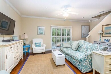 Spacious family room with plantation shutters