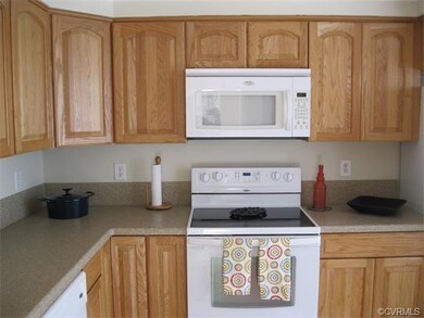 Dishwasher, flat top range, microwave, refrigerato