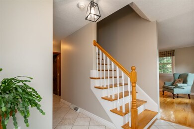 Ceramic tile flooring.  Coat closet.  NEST thermos