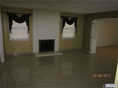 Beautiful living room complete with warm and invit
