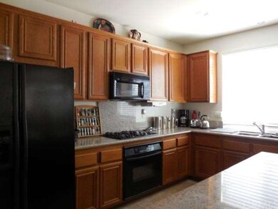 Open Kitchen with granite countertop, gas cooktop
