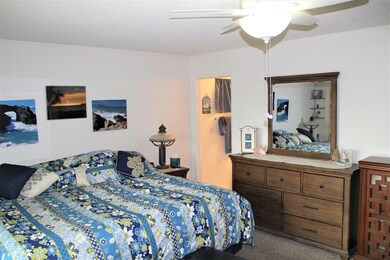 Primary room to bathroom view