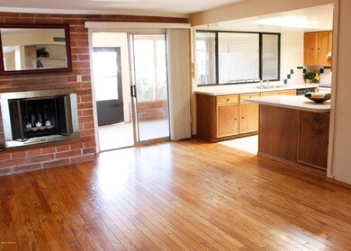 Enjoy Fireplace from open Kitchen