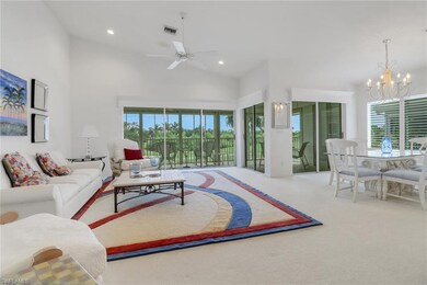 Carpeted living area with recessed lighting, high 