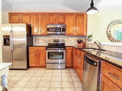 Kitchen with all stainless appliances and granite 
