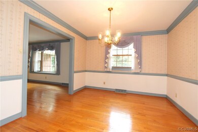 Dining Room with HW Floor, Chair Rail and Crown Mo