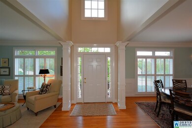 Two story foyer with lots of light, updated chande
