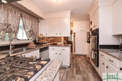 Kitchen with new gas cooktop, new double ovens and