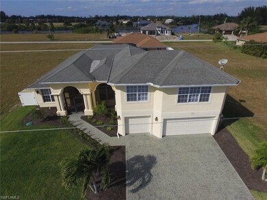 Situated nicely on a double lot, automatically irrigated and landscaped featuring Florida friendly trees and bushes.