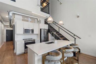 Cooks dream kitchen, stainless steel appliances, solid surface counter tops and more.