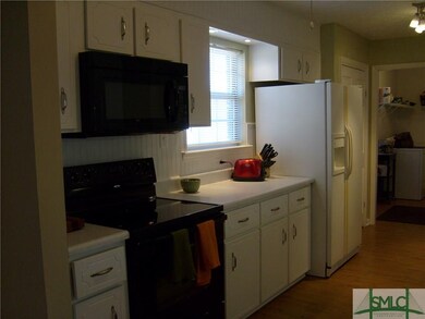 Large Galley Kitchen.  Plenty of Cabinets and Coun