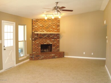 Family room with brick fireplace