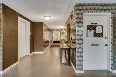 One of two elevators in the building.  Down the ha