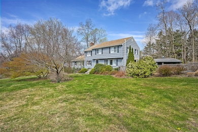 Front view with expansive front lawn