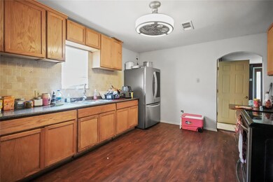 Kitchen featuring sink, appliances with stainless 