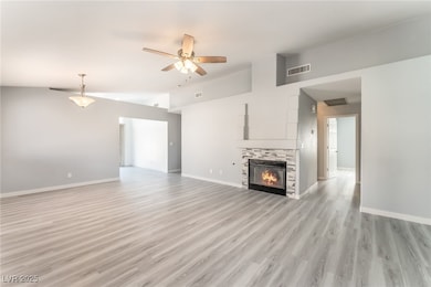 Unfurnished living room with lofted ceiling, ceili