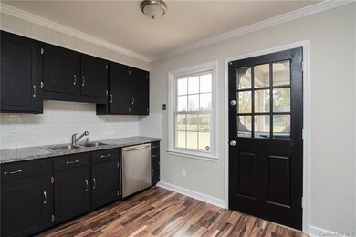 Cabinets all have new hardware.  The door to the r