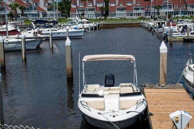 Dock featuring a water view