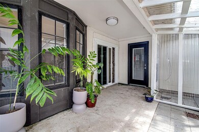 Entrance to property with a patio area