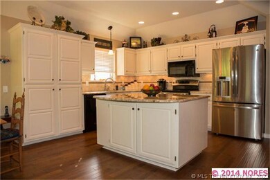 Lots of cabinet space and custom built pantry area