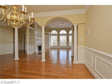 Dining Room. View from dining room to great room, and master suite to left.