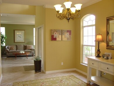 Large Formal dining room with crown molding off fo